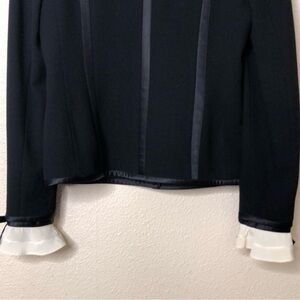 Rena Lange black virgin wool with silk trim